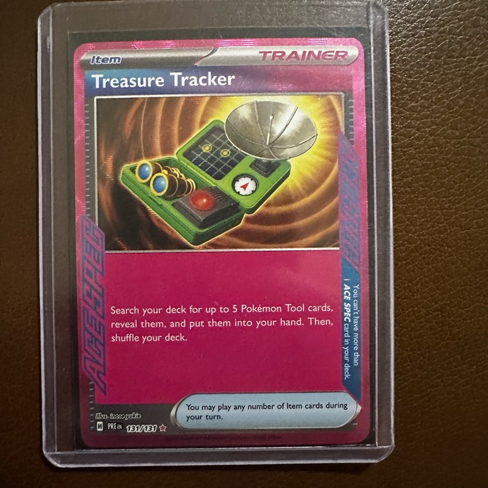 Pokémon Trainer Card - Treasure Tracker 131/131 (Pokémon prismatic evolutions)